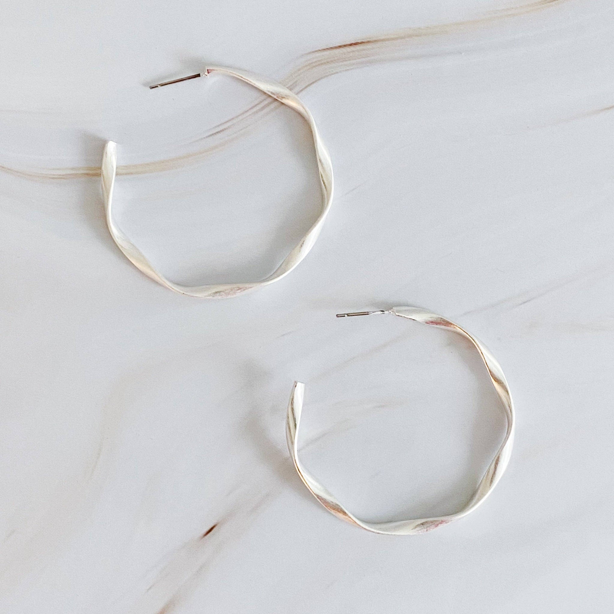 Gentle Wave Sleek Hoop Earrings